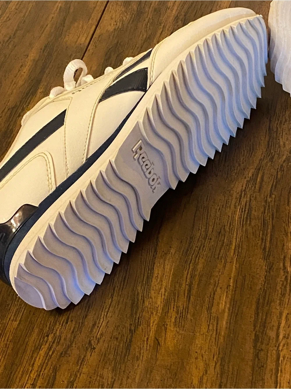 Reebok Women’s Ortholite White Athletic Sneakers with Navy Accents